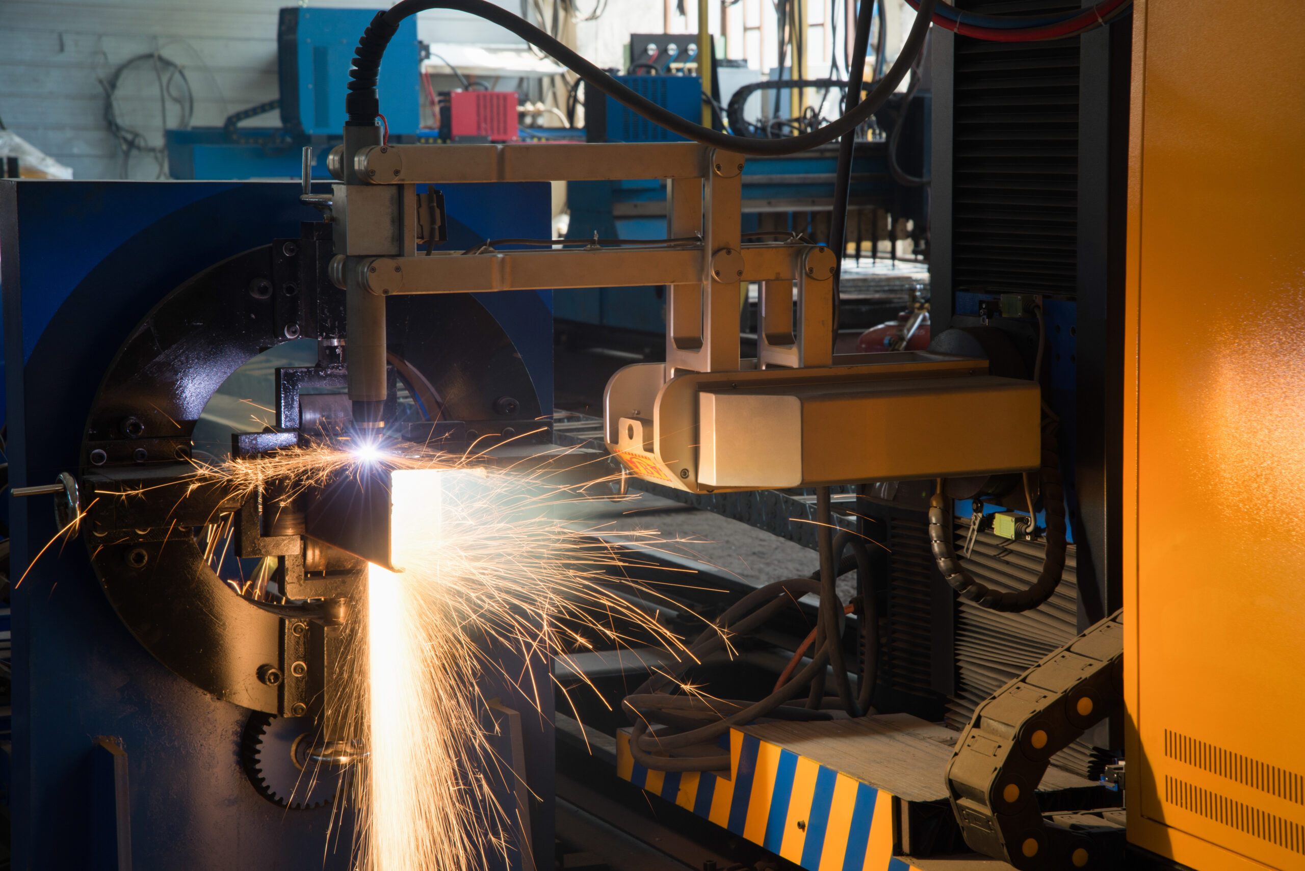 automatic laser machine cuts metal profile, close-up. pipe cutting system